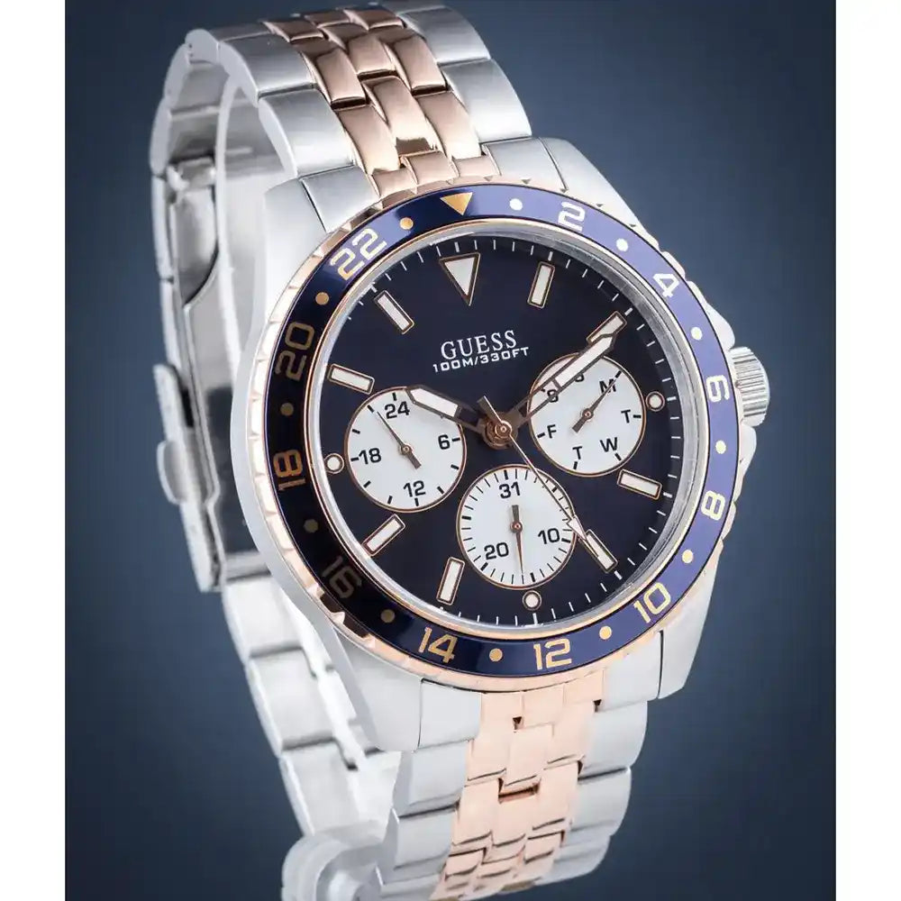 Montre Homme Guess Odyssey W1107G3 cadrdan bleu avec braclet bicolor or rose et argent Guess