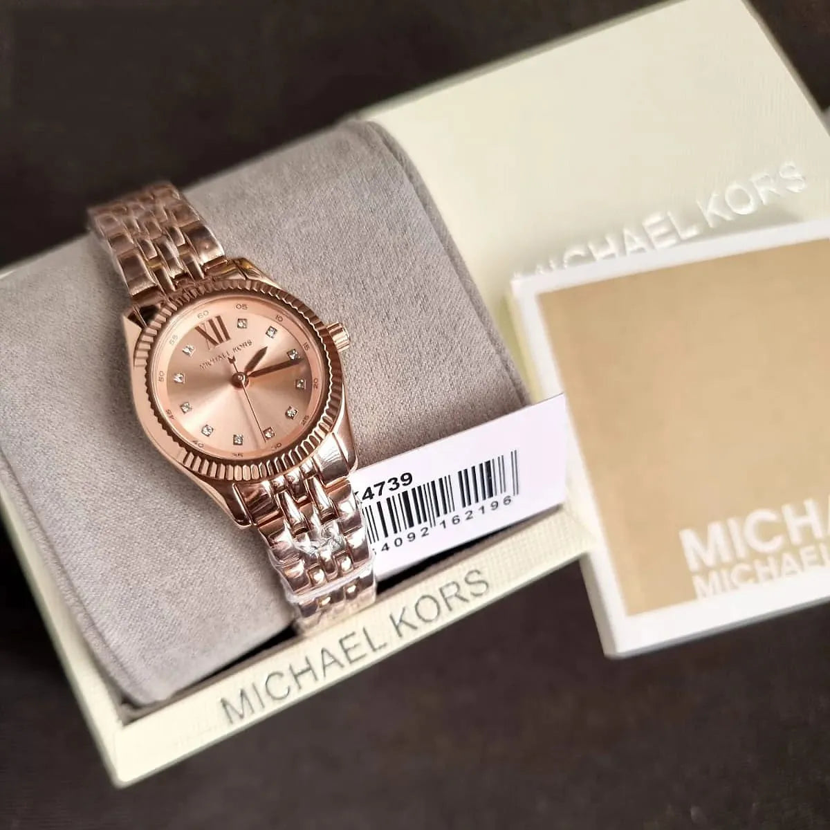 Montre Michael Kors Lexington à trois aiguilles avec cadran en or rose et bracelet en acier or rose pour femme - MK4739